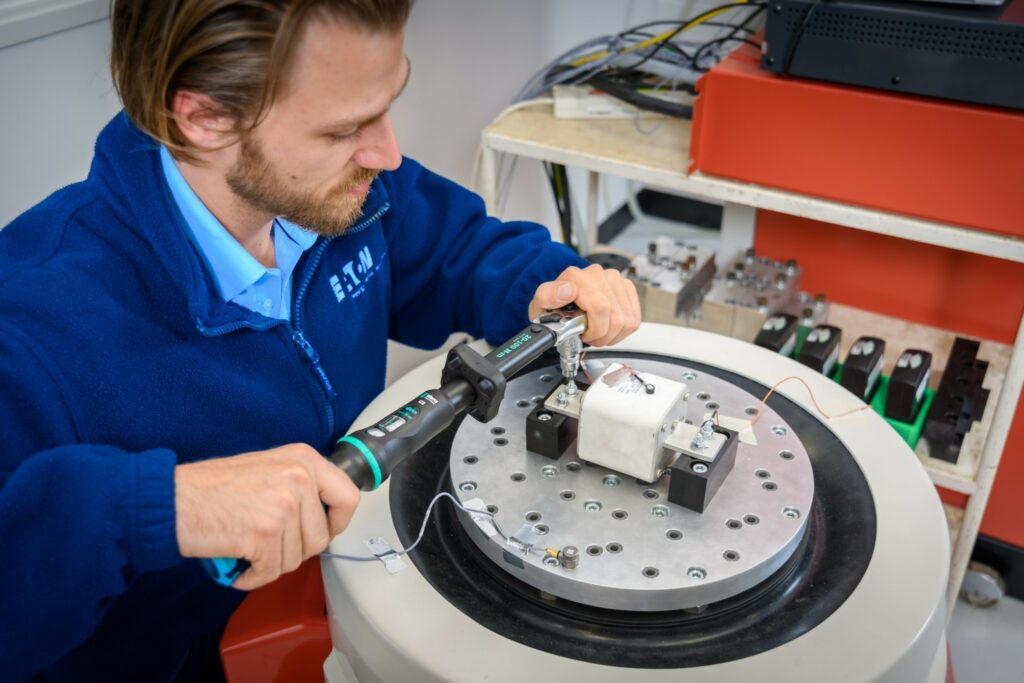 Eaton engineer performs tests on a fuse for electrified commercial vehicles